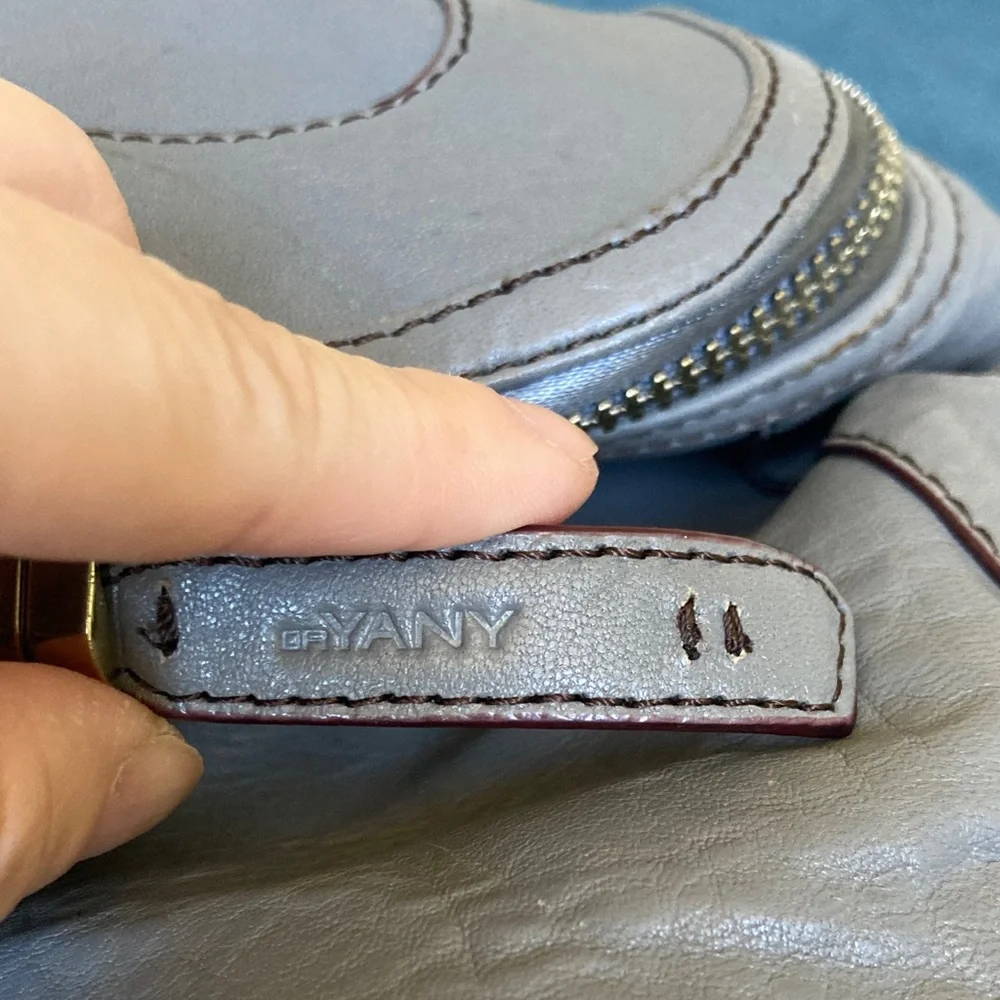 orYANY Zahara Gray Leather Backpack with Gold Accents